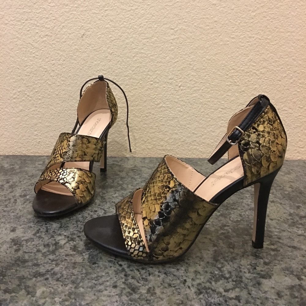Gold/black heels